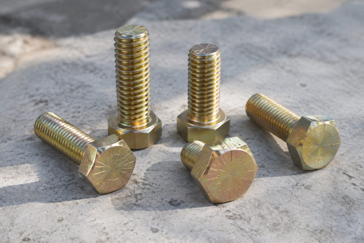 Yellow zinc Grade 8 hex cap screws with six radial lines on the heads
